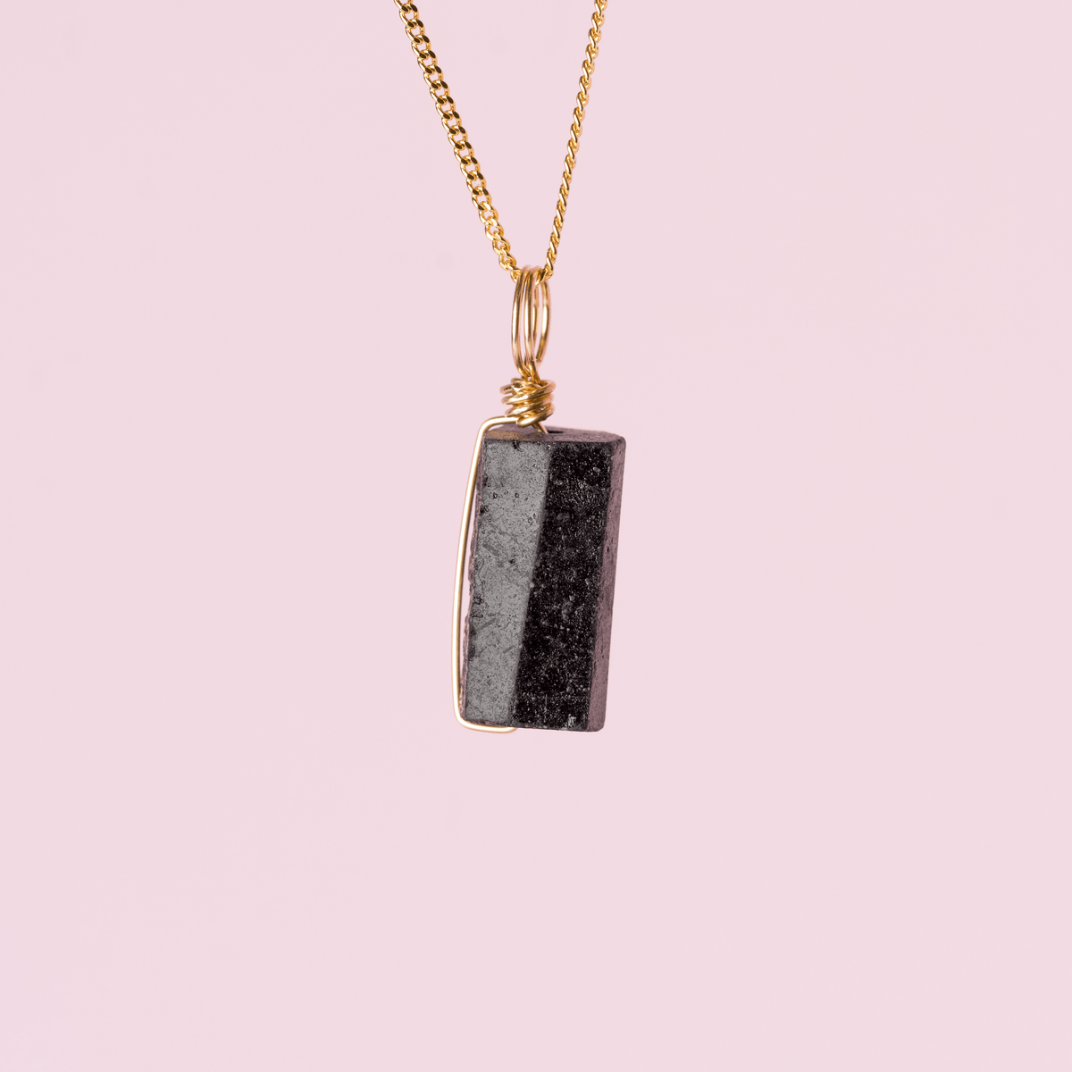 Wire wrapped black tourmaline crystal charm for protection