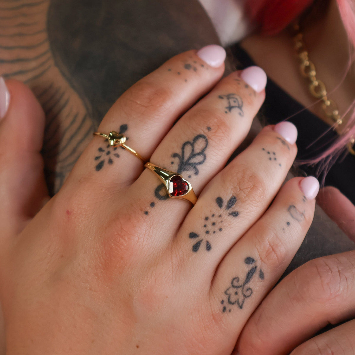 Crimson garnet heart ring in gold