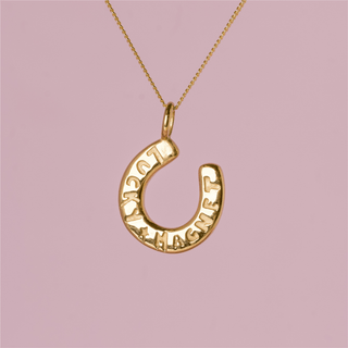 Lucky horseshoe charm in waterproof gold